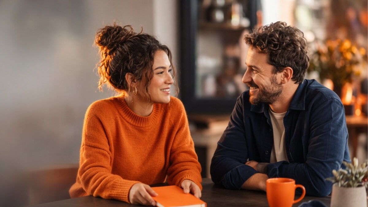 wo small business owners making a personal connection in marketing over coffee.
