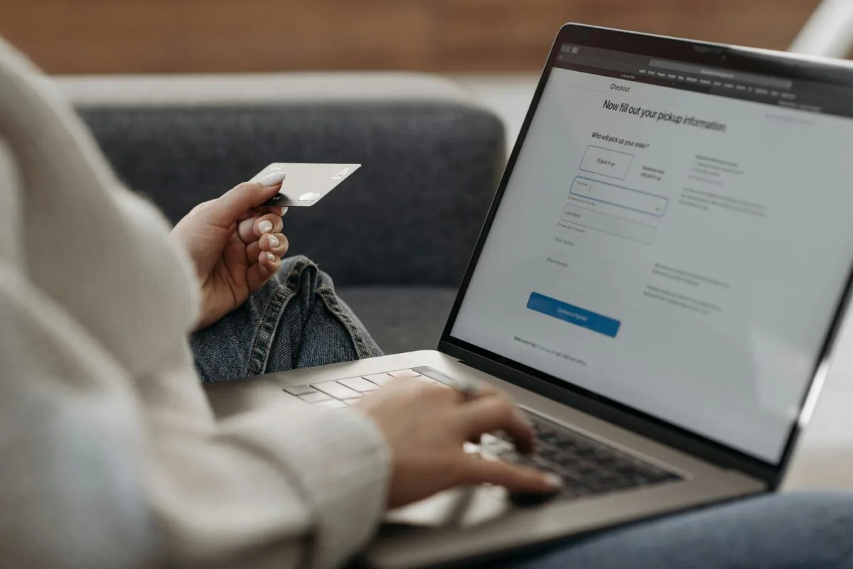 woman holding credit card for privacy woman holding credit card for digital account management